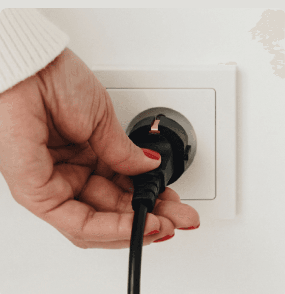 Piccolo's plug going into a standard household wall socket